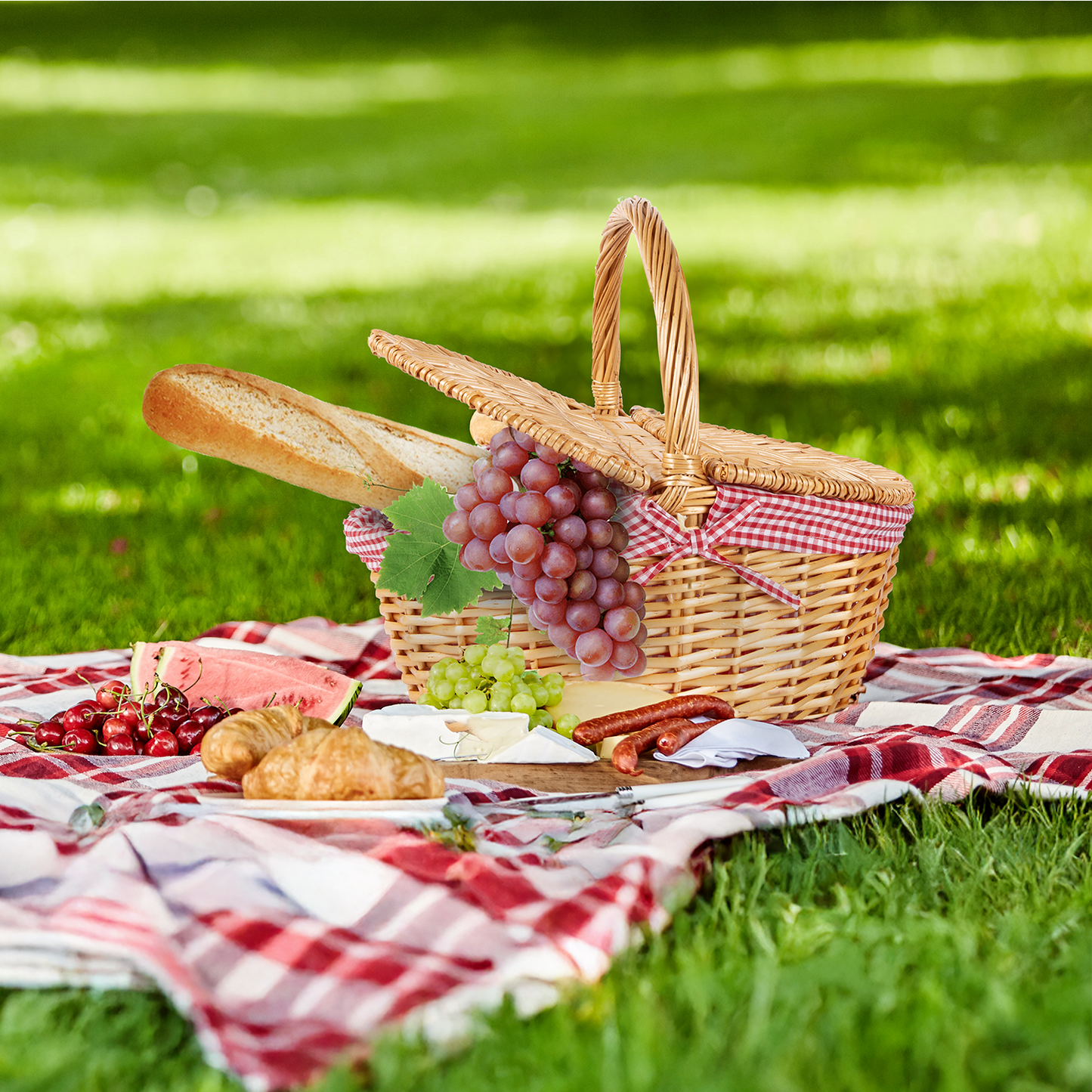 Oval Lidded Wicker Picnic Basket with Red & White Checked Lining